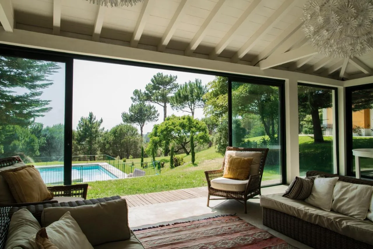 Pool house lounge looking out over the pool